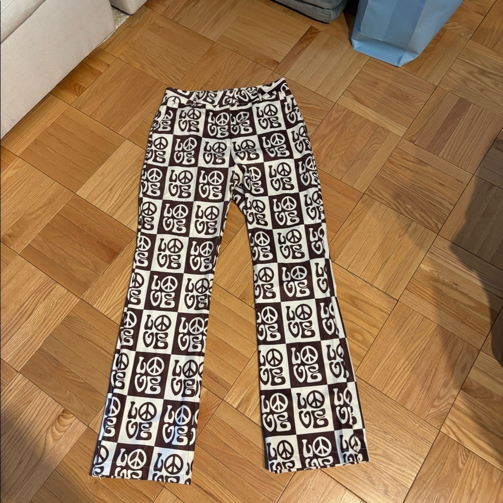 House of Sunny kick flare peace pants. Size 8